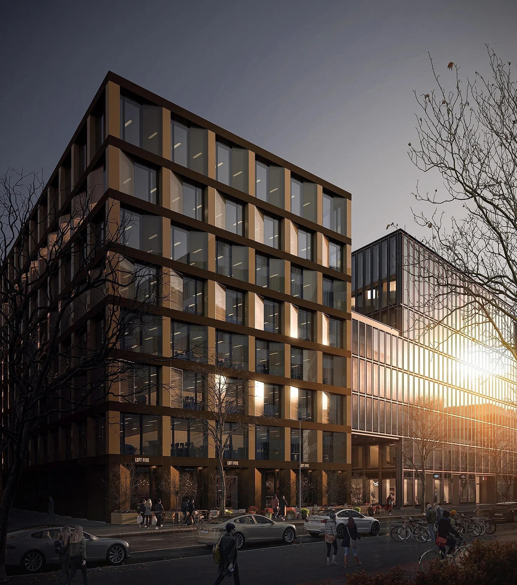 Office buildings with glass facades at sunset, people walking