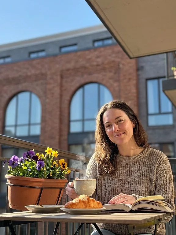Breakfast on a balcony of a new apartment building